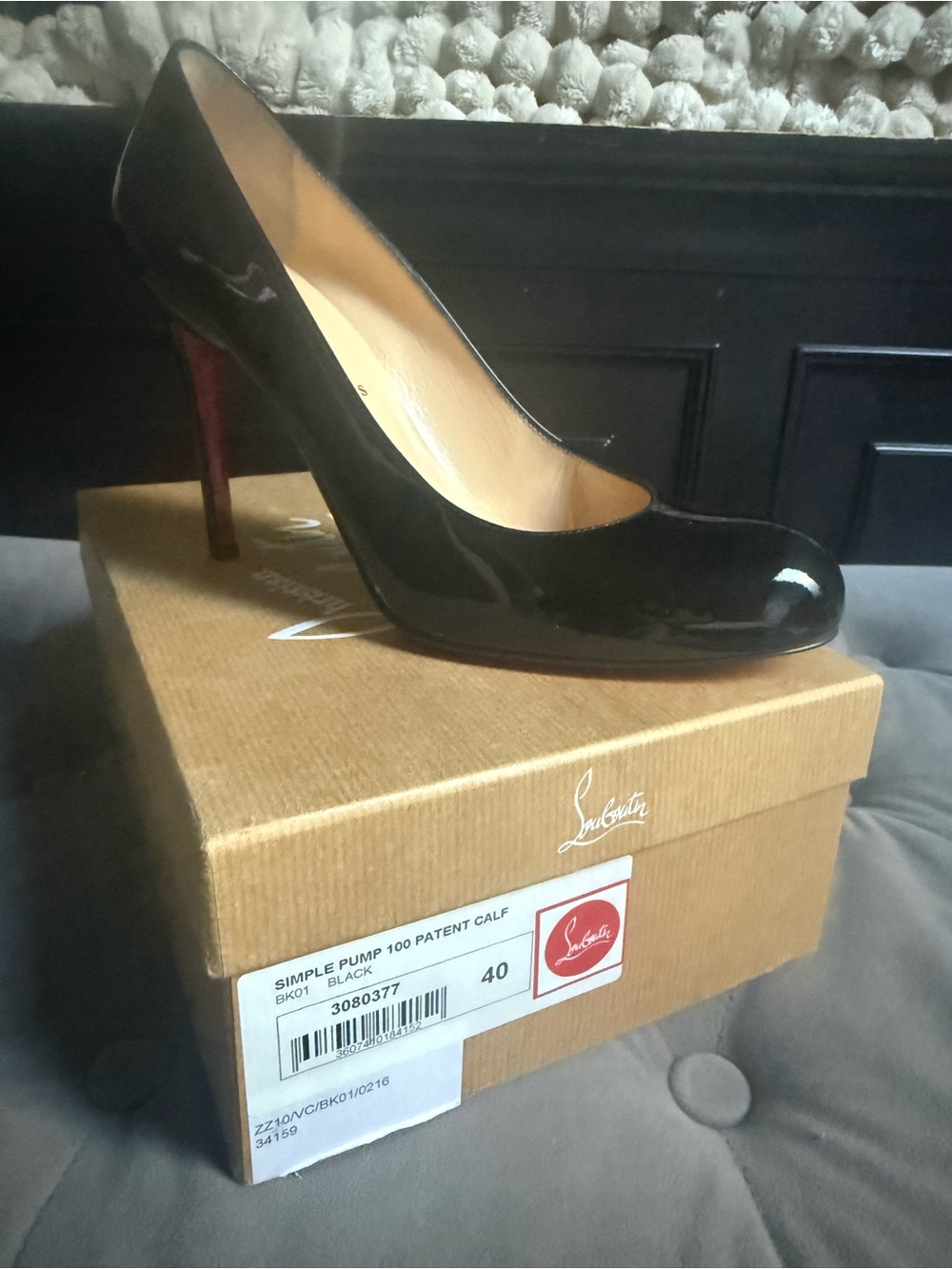 Christian Louboutin Black Patent Pump with Red Sole